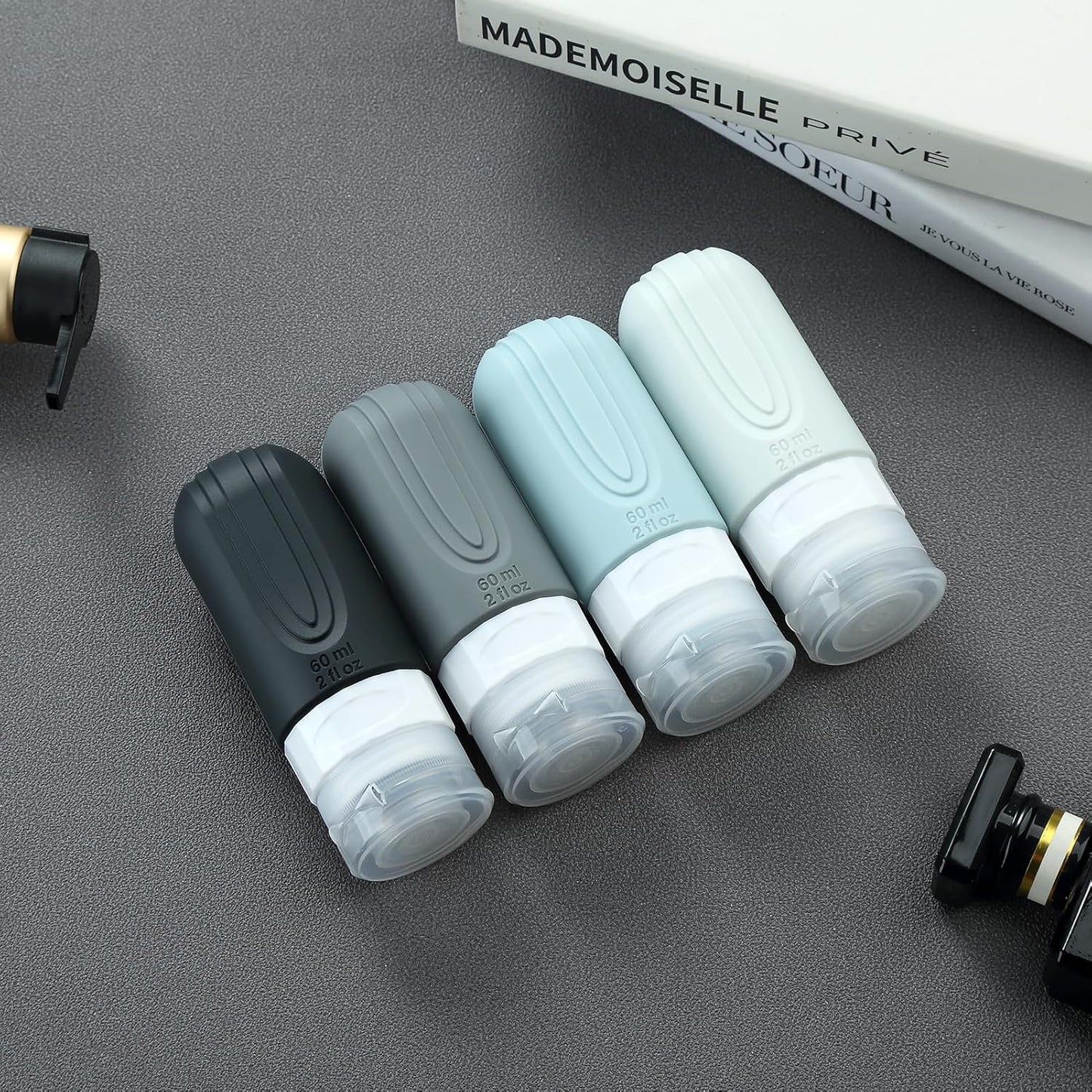 Travel Bottles for Toiletries, Tsa Approved 2oz Travel size Bottles, BPA Free Leak Proof Travels Toiletry Containers, Traveler Accessories with Toiletry Bag for Shampoo Liquid (4 Pack)