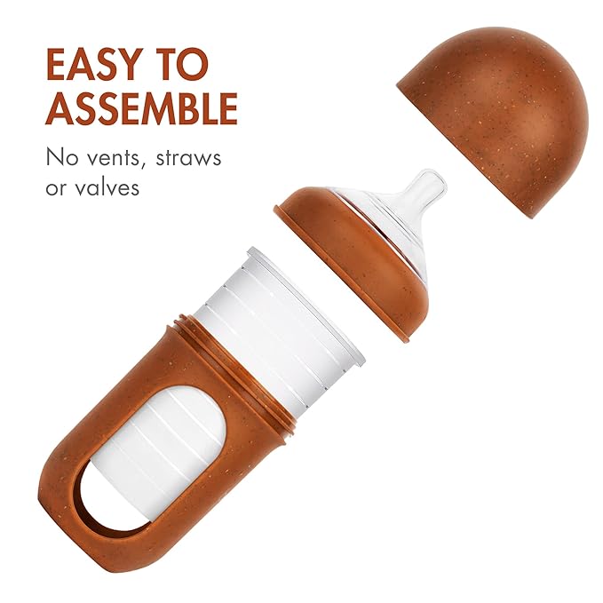 Boon Nursh Bottles - Silicone Baby Bottles Help Ease Colic Symptoms - Formula and Breast Milk Only Touch Food-Grade Silicone - Medium Flow - 8 Oz - Speckle