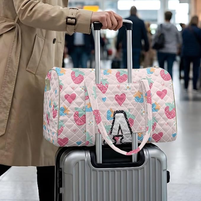 COEQINE Print Quilted Travel Duffle Bag For Women Travel Pink Heart Initial Name A-Z Personal Item Travel Bag with Shoulder Strap and Trolley Sleeve Large Packable Travel Bag