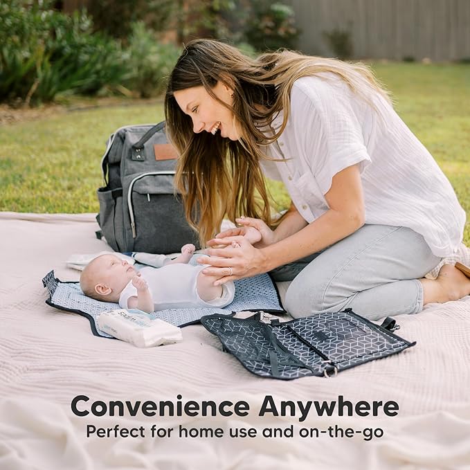 KeaBabies Portable Diaper Changing Pad - Large Waterproof Baby Changing Mat, Compact Travel Diaper Clutch, Functional Pockets Fit Newborn Essentials, Wipeable & Padded Baby Changer (Dino Ridge)