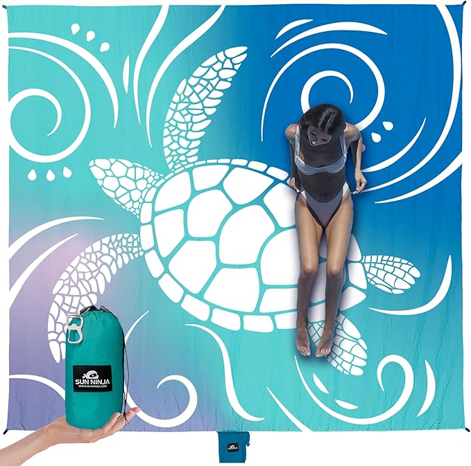 SUN NINJA Oversized Beach Blanket - Sandproof Beach Blanket, 10ft x 9ft Sand Free Blanket, Lightweight, Water Resistant, Includes Carry Bag, 4 Pegs, Shoulder Strap for Family Outings