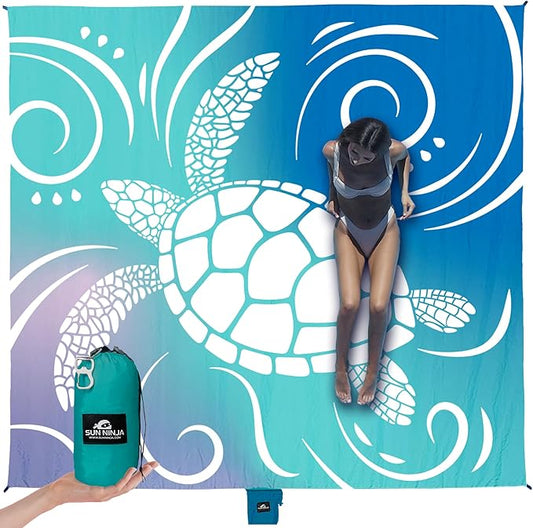 SUN NINJA Oversized Beach Blanket - Sandproof Beach Blanket, 10ft x 9ft Sand Free Blanket, Lightweight, Water Resistant, Includes Carry Bag, 4 Pegs, Shoulder Strap for Family Outings